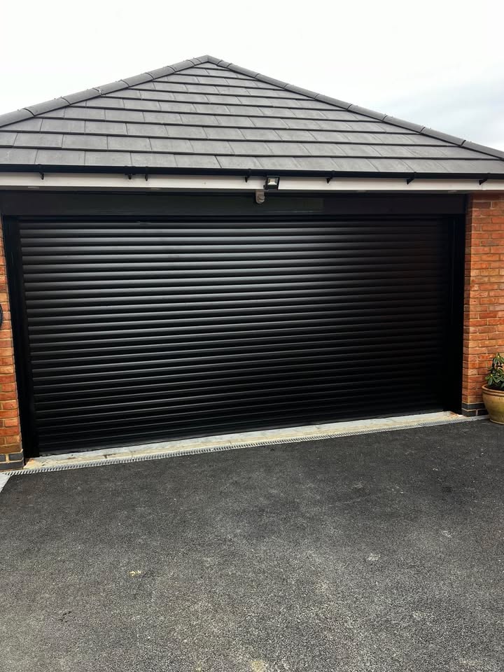 Black roller garage door with modern design